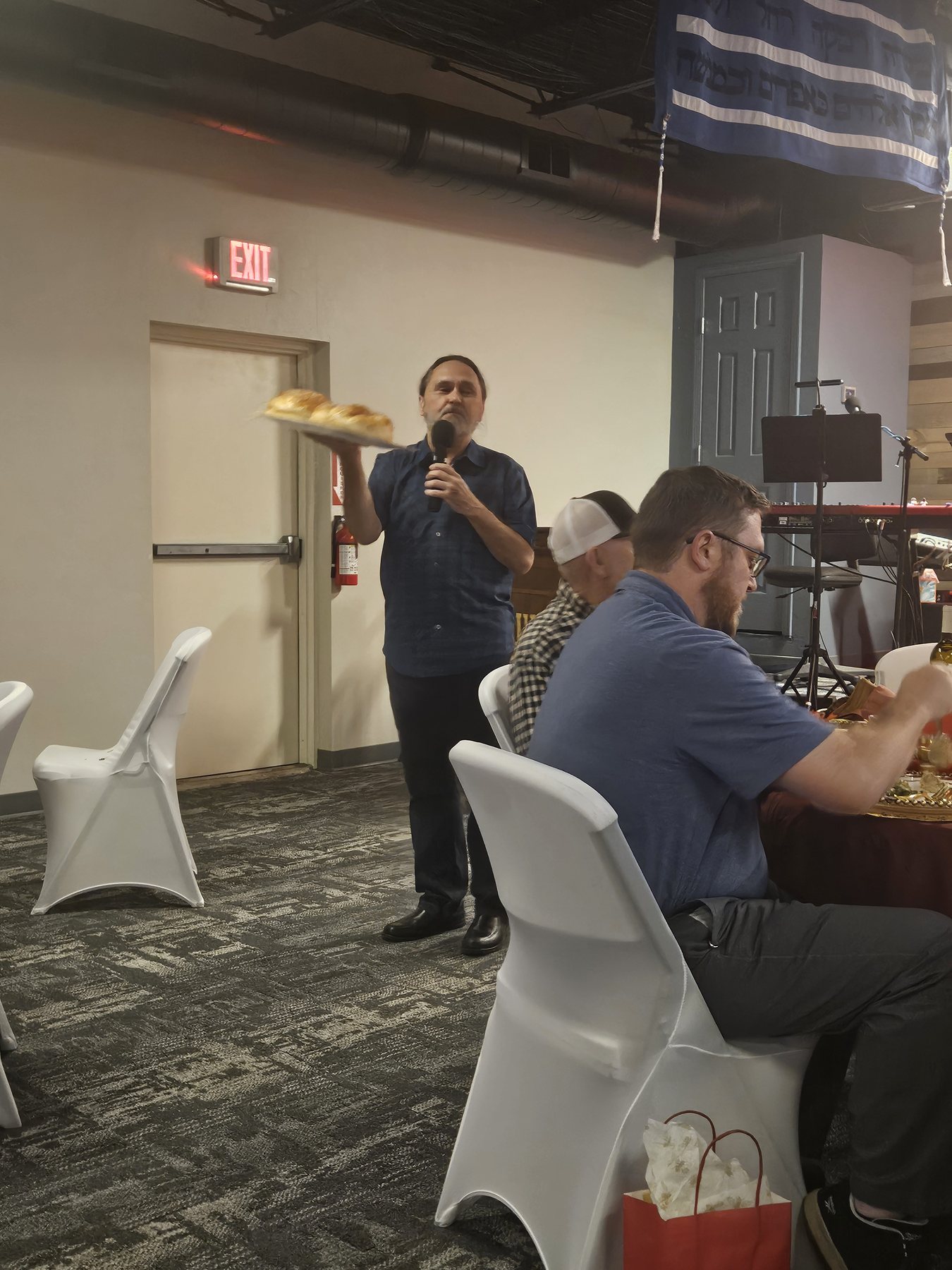 Woman speaking at the Rosh Hashanah gathering