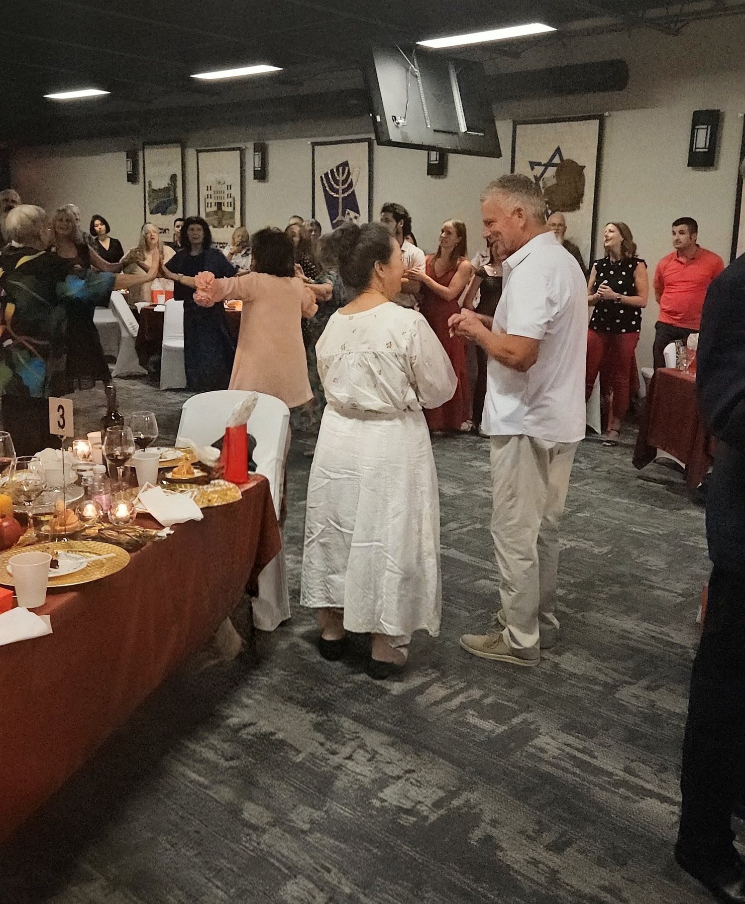 Couple dancing at the celebration