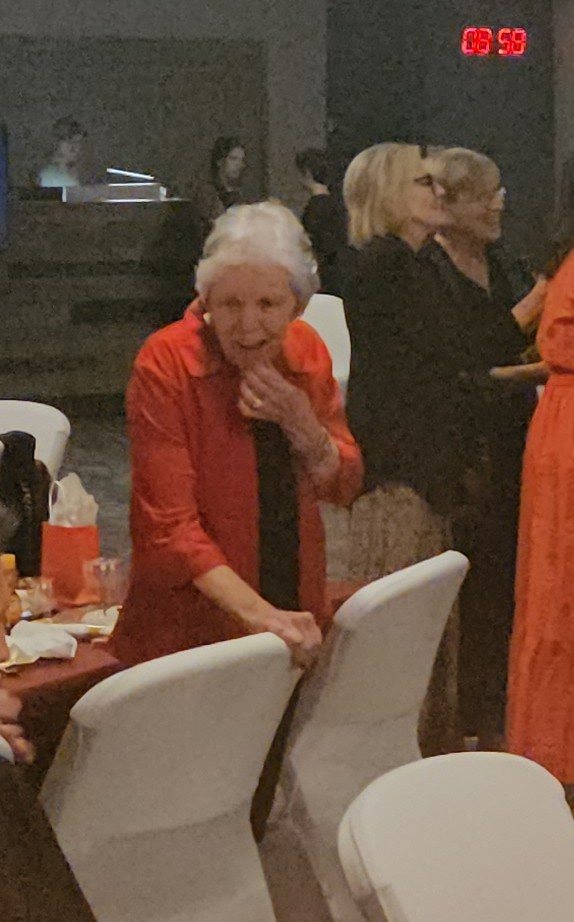 Woman in red during the celebration