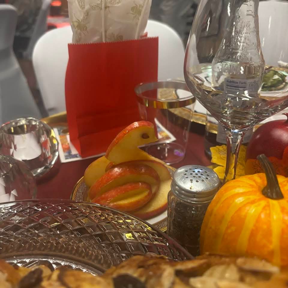 Apple swan and autumn centerpiece on the feast table